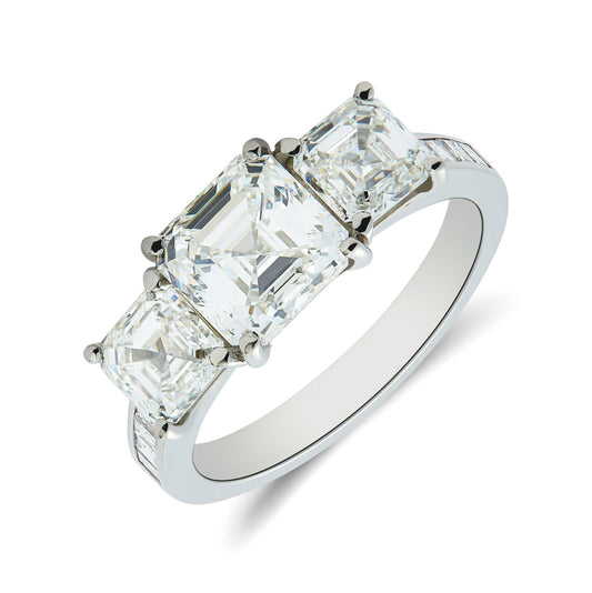 Platinum Ascher cut diamond three stone ring. Henry D Johnstone Jewellers. Alderley Edge, Poynton, Cheshire.