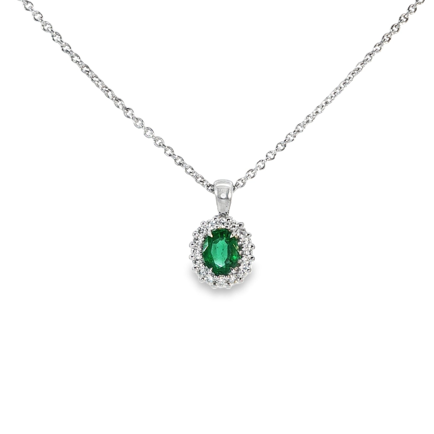 14ct White Gold Emerald & Diamond Halo Pendant. E:0.38ct D0.11ct