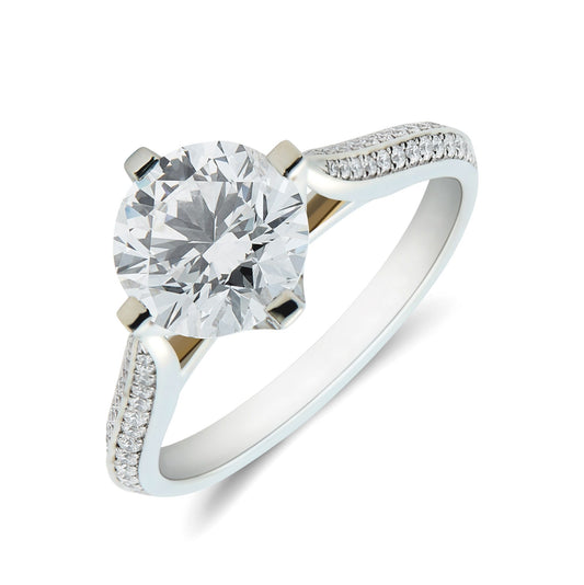 Platinum & round brilliant cut diamond solitaire ring with diamond set shank. Henry D Johnstone Jewellers. Alderley Edge, Poynton, Cheshire.