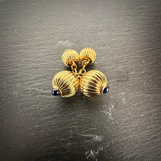 Pre-Owned: Cartier 18ct yellow gold cuff-links set with cabochon-cut sapphires.
