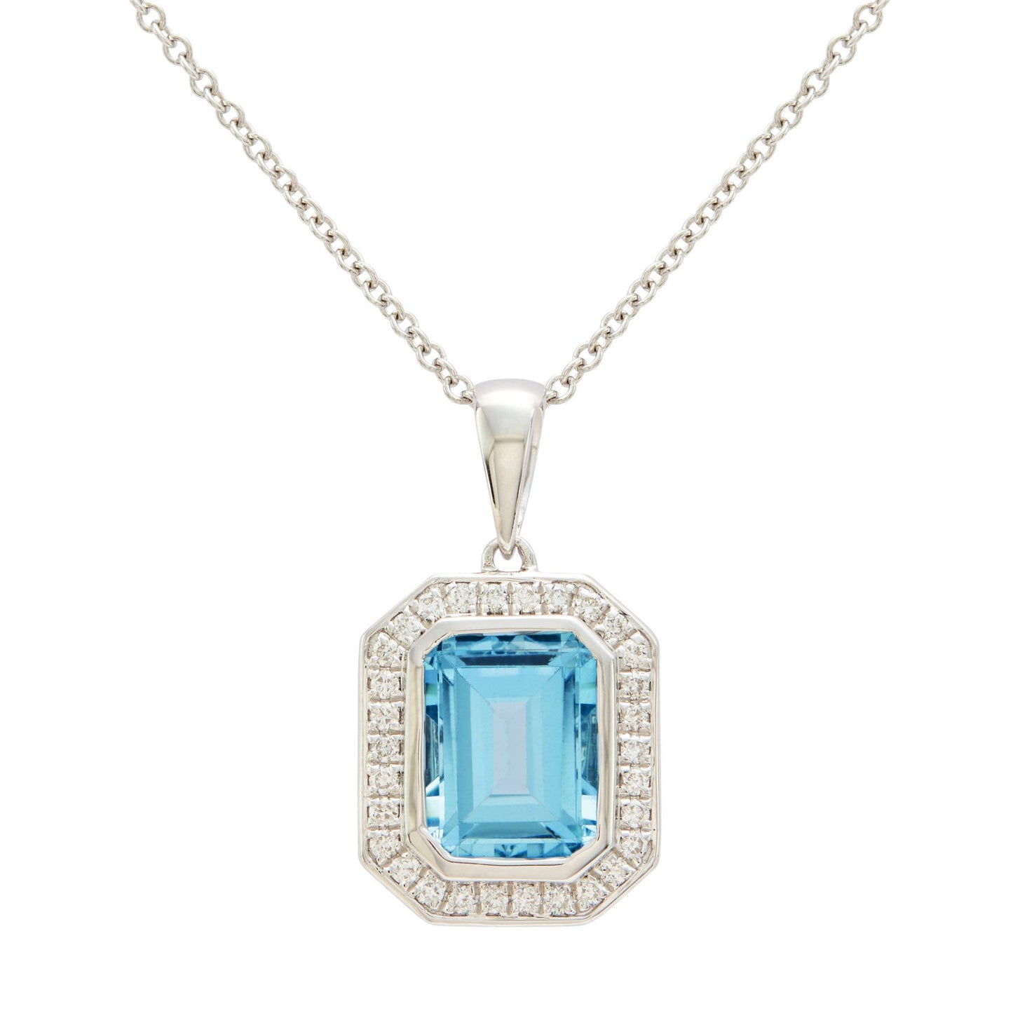 9ct white gold emerald cut blue topaz & diamond halo set pendant . Henry D Johnstone Jewellers, Alderley Edge, Poynton, Cheshire.