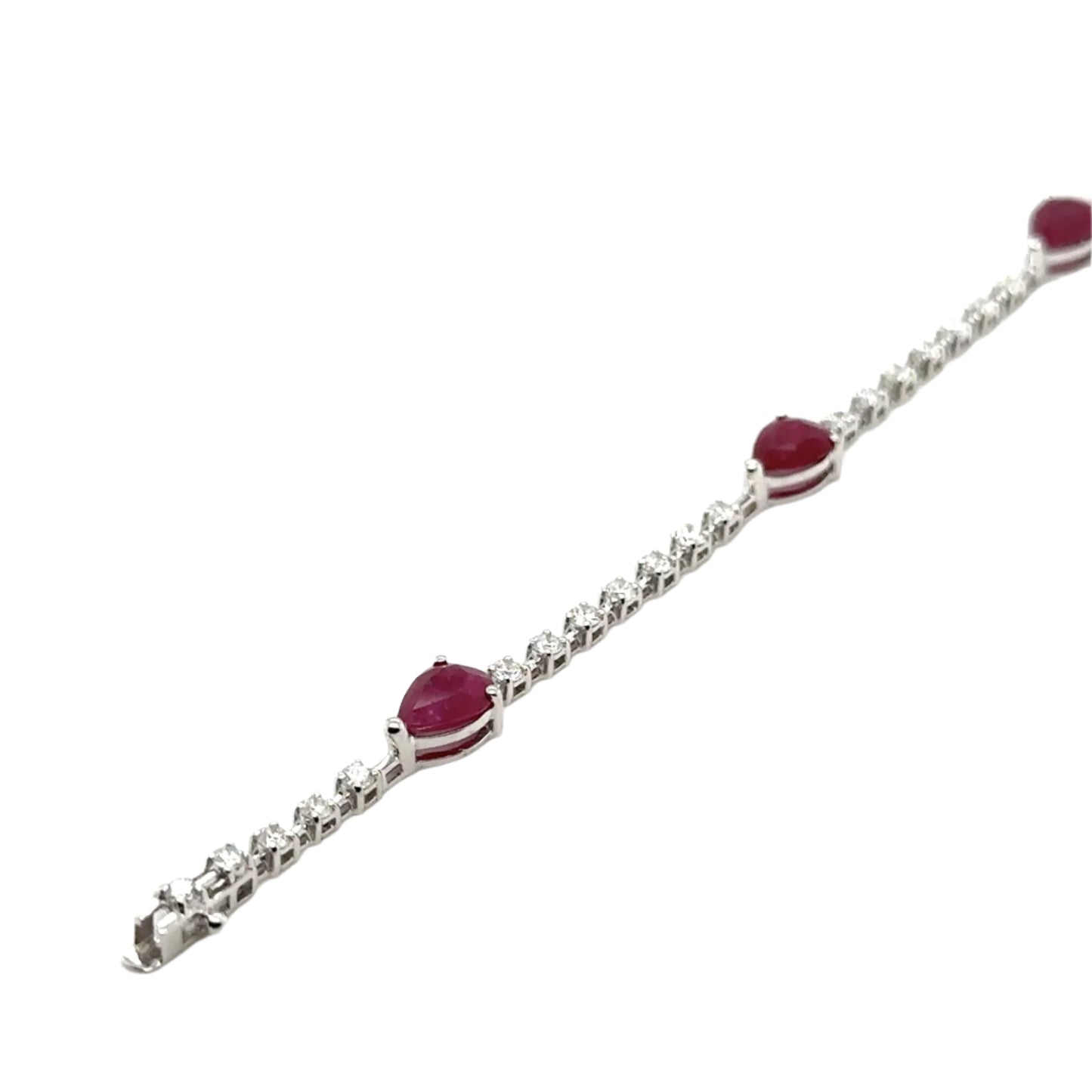 9ct White gold pear shape ruby and diamond line bracelet- R:3.66ct/D:1.20ct