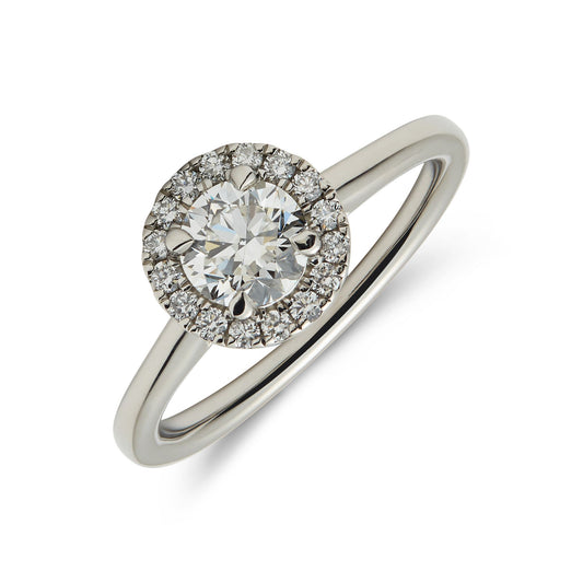 Platinum & round brilliant cut diamond solitaire ring with diamond set halo. Henry D Johnstone Jewellers. Alderley Edge, Poynton, Cheshire.
