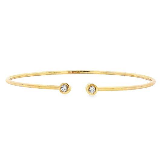 18ct yellow gold 'twist & torc' diamond set bangle - 0.10ct