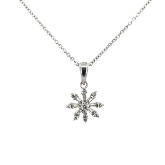One 9ct white gold diamond set snowflake pendant.