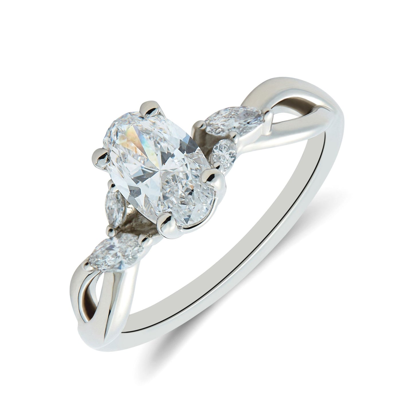 Bespoke platinum & oval cut diamond solitaire ring with marquise diamond set shoulders. Henry D Johnstone Jewellers. Alderley Edge, Poynton, Cheshire.
