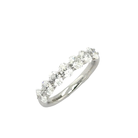 One platinum oval brilliant cut claw set half eternity ring - 1.40ct