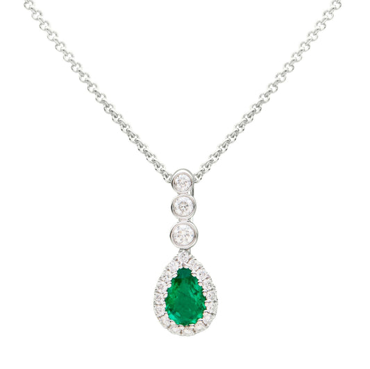 18ct white gold pear cut emerald & brilliant cut diamond drop pendant. Henry D Johnstone Jewellers, Alderley Edge, Poynton, Cheshire.