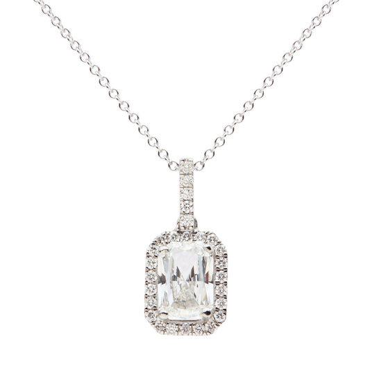 LAB GROWN: Platinum lab grown radiant cut diamond halo pendant.