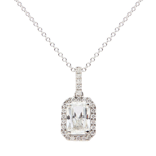 Platinum lab grown radiant cut diamond halo pendant. Henry D Johnstone Jewellers, Alderley Edge, Poynton, Cheshire.