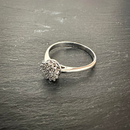 Pre-Owned: Precious white metal diamond ring with diamond claw set border - 0.34ct