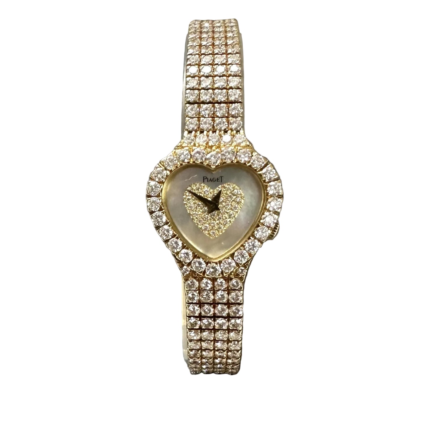 Piaget 18ct yellow gold heart shaped diamond set quartz ladies watch. Henry D Johnstone Jewellers. Alderley Edge, Poynton, Cheshire.