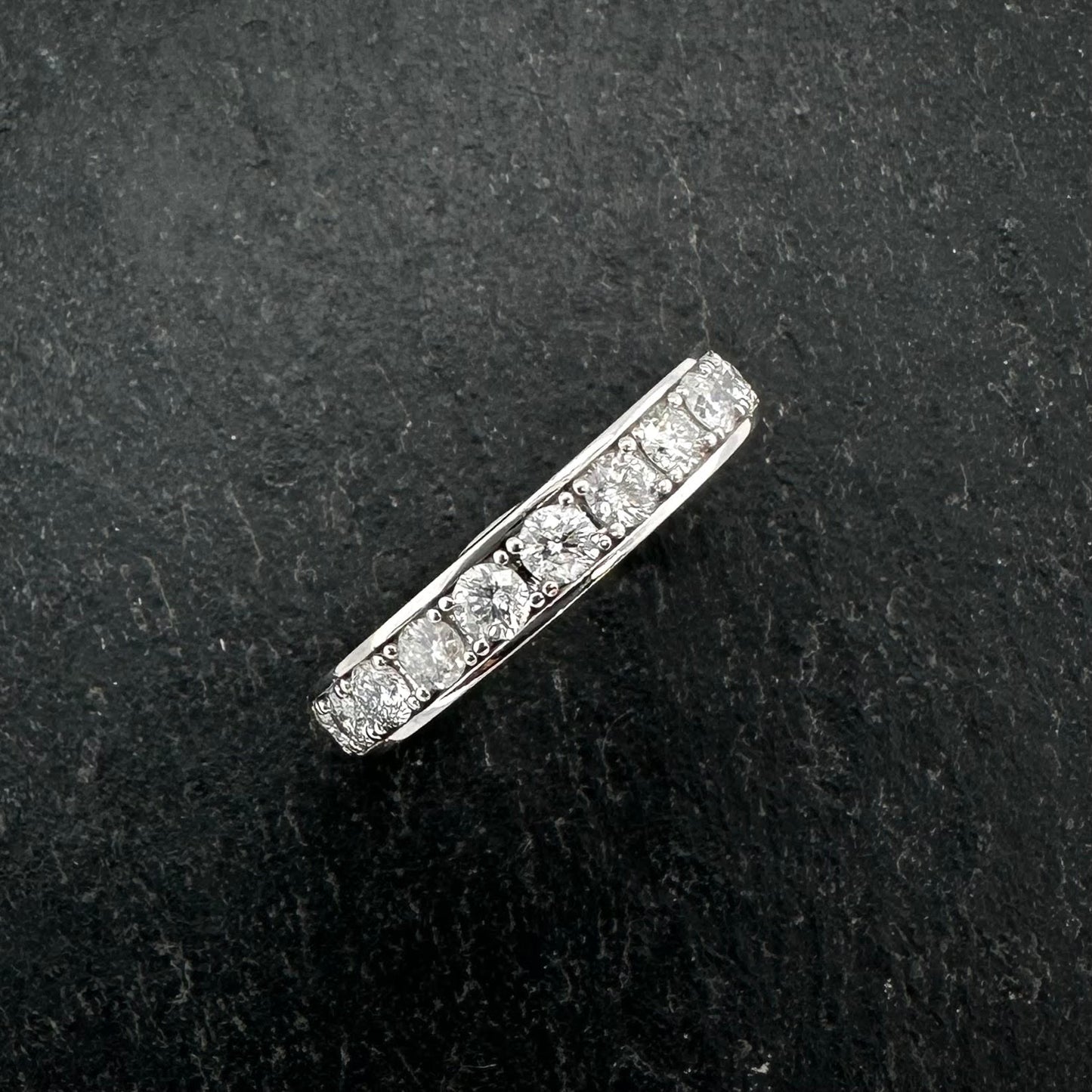 Pre-Owned: 14ct white gold & round brilliant cut diamond grain set eternity ring.