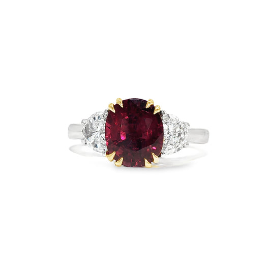 Bespoke: One platinum & 18ct yellow Siam ruby and diamond three stone ring - R2.68ct / D0.70ct.