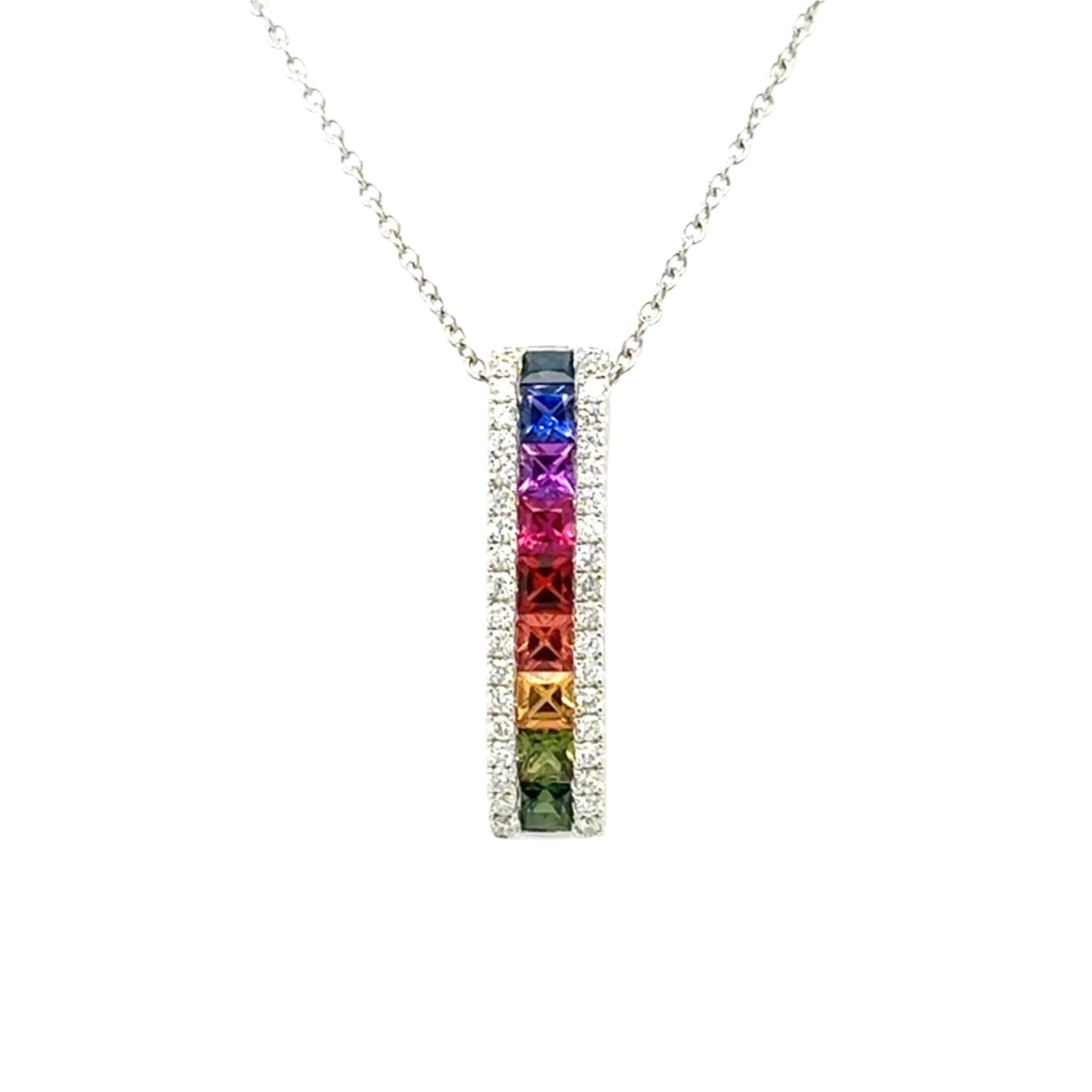 18ct whited gold 'rainbow' square sapphire and brilliant diamond bar slider pendant.