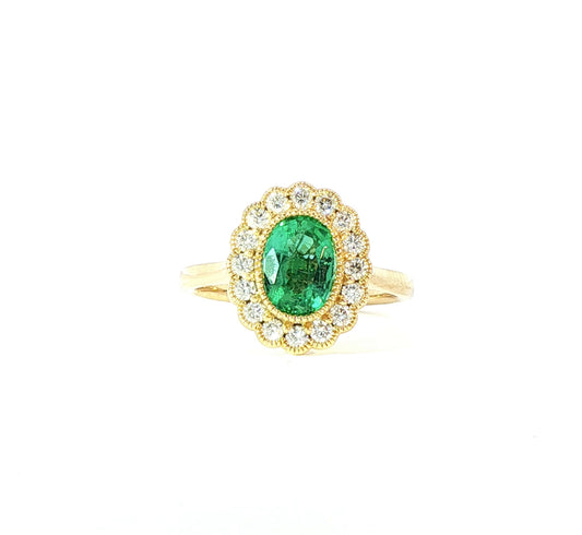18ct yellow gold oval emerald and brilliant cut diamond floral vintage cluster ring.
