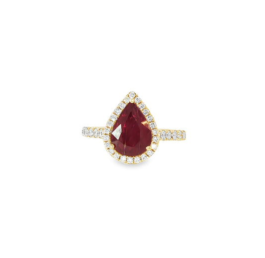 18ct yellow gold pear cut ruby and brilliant cut diamond halo ring.