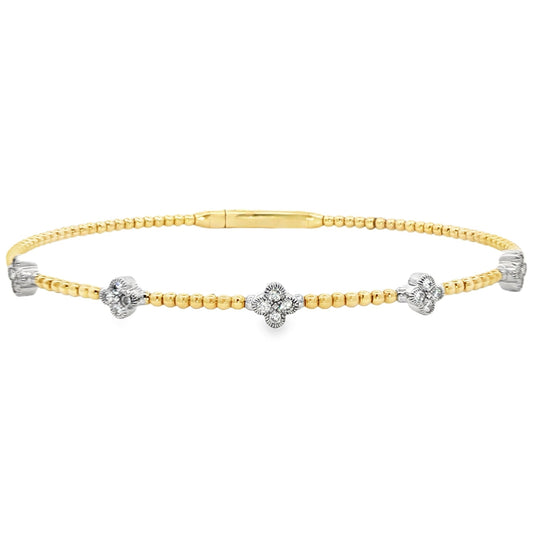 14ct Yellow Gold Fine Ribbed Wire Bangle With Five Clover Shaped Diamond Set Elements.