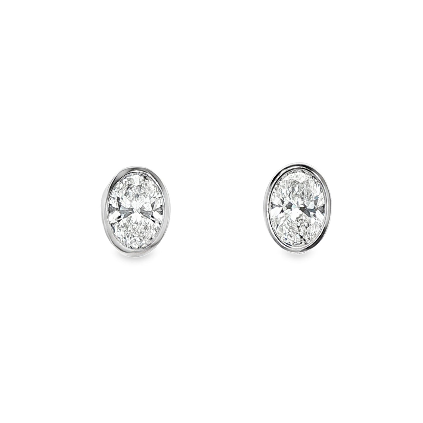 LAB GROWN: Platinum Oval Cut Diamond Studs in Rubover Setting - 2.20ct