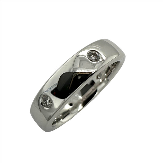 Diamond set precious white metal ring. Henry D Johnstone Jewellers. Alderley Edge, Poynton, Cheshire.