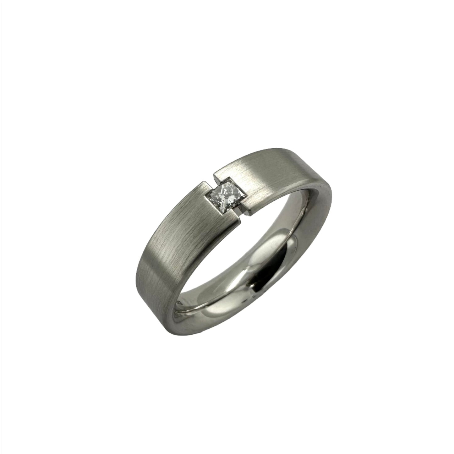 Princess cut diamond set in precious white metal ring. Henry D Johnstone Jewellers. Alderley Edge, Poynton, Cheshire.