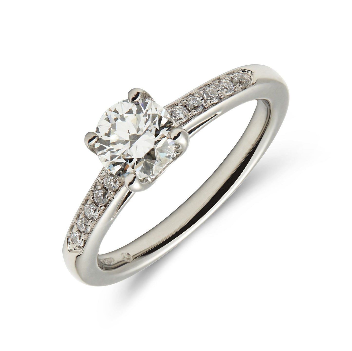 Platinum & round brilliant cut diamond solitaire ring with diamond set shoulder. Henry D Johnstone Jewellers. Alderley Edge, Poynton, Cheshire.