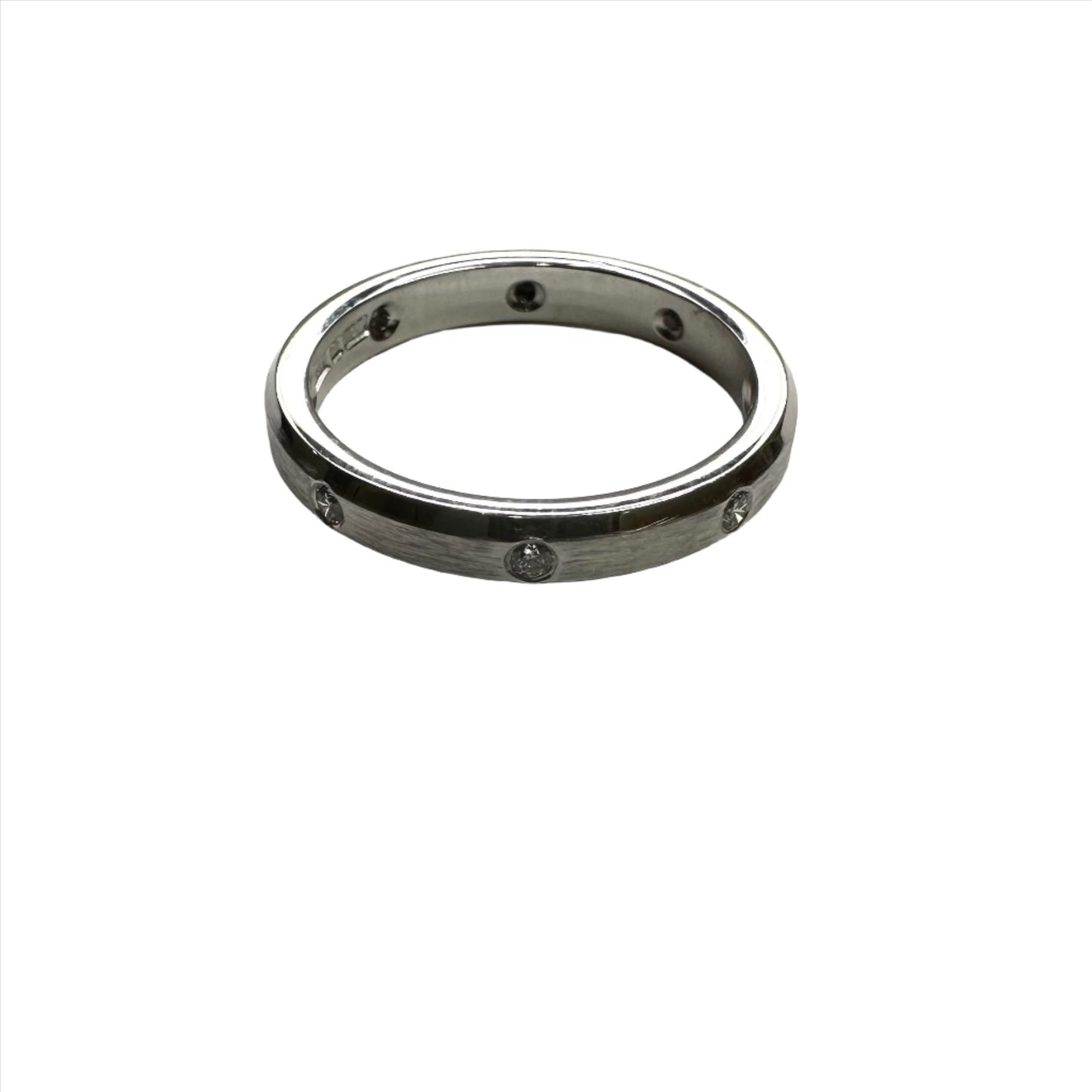 Brushed finish white gold wedding band with diamonds