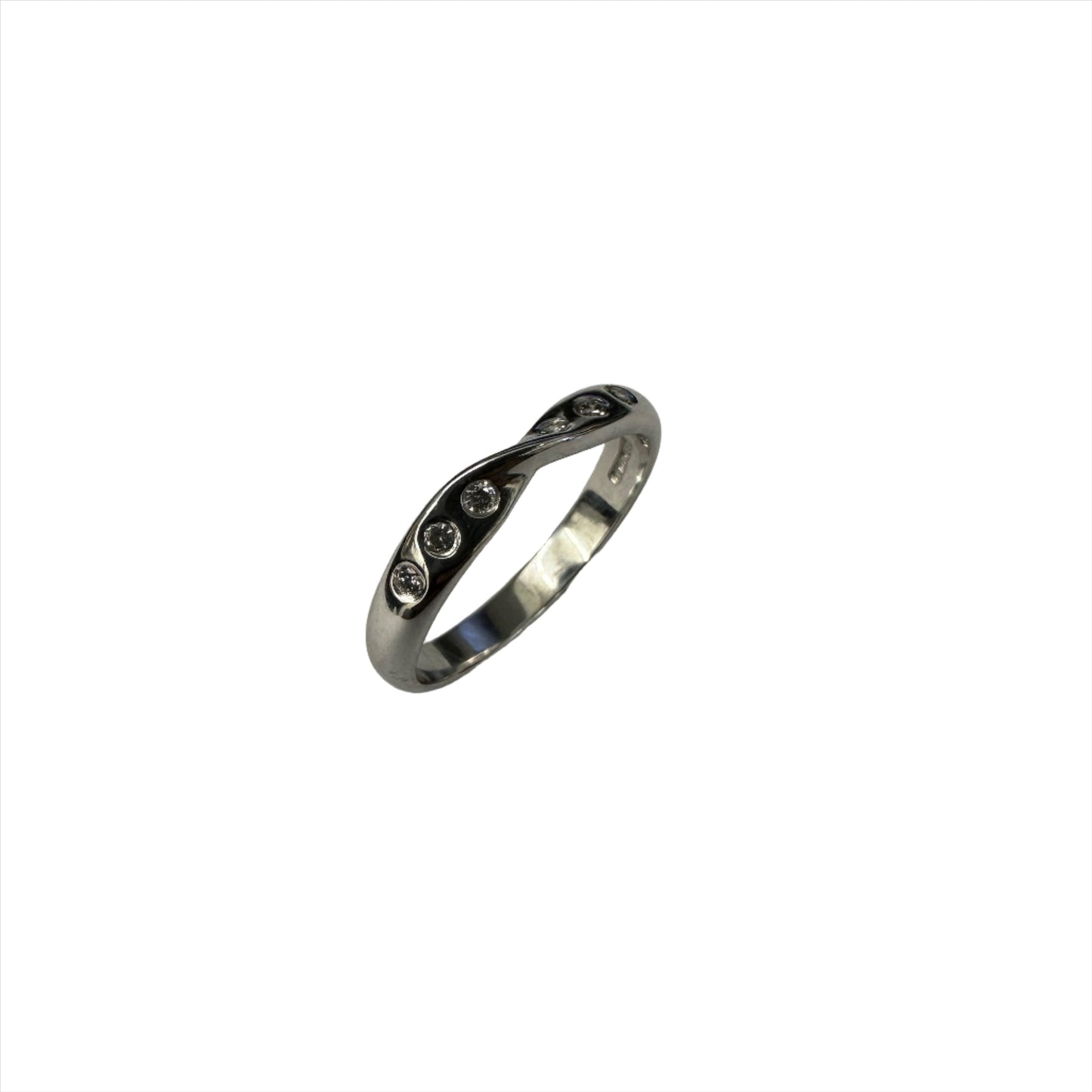 White gold wedding band with diamonds. Henry D Johnstone Jewellers. Alderley Edge, Poynton, Cheshire.