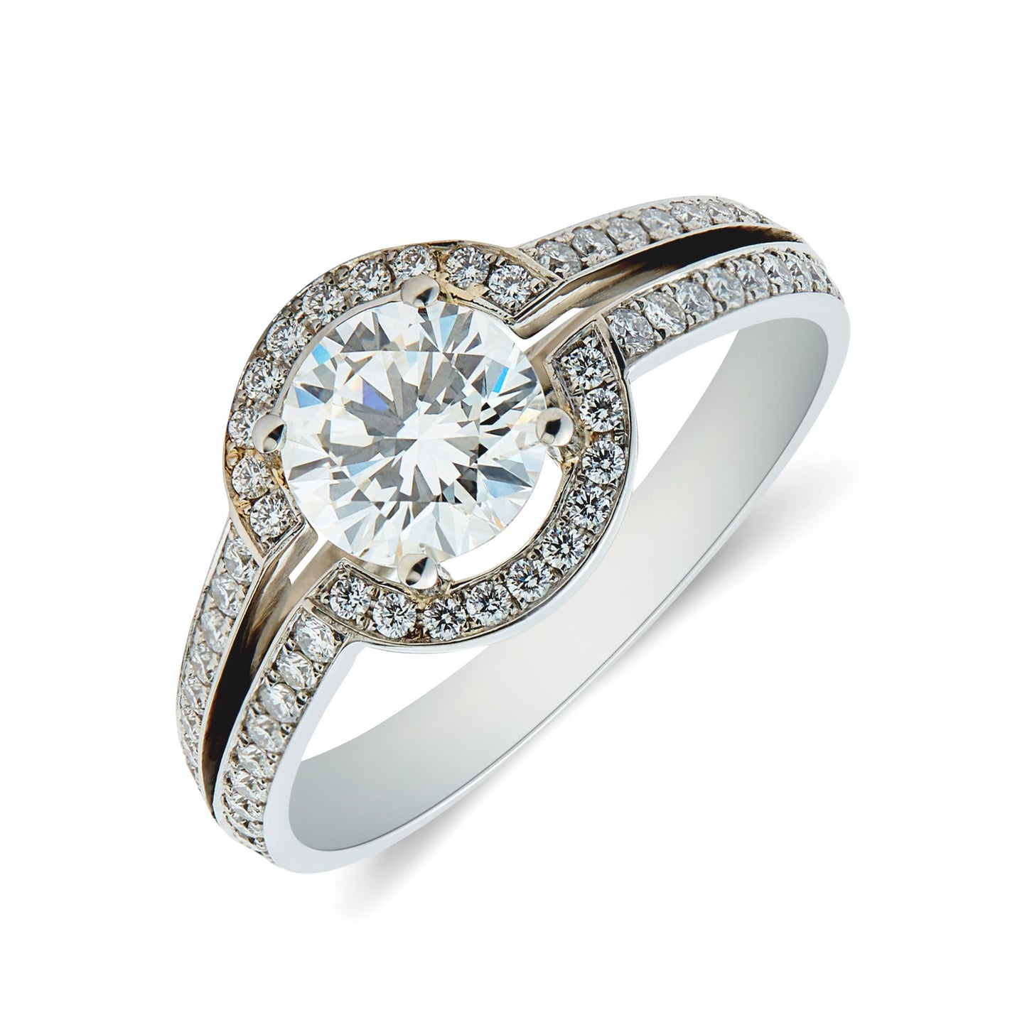 Platinum round brilliant cut diamond solitaire ring grain set surround & open split shoulders. Henry D Johnstone Jewellers. Alderley Edge, Poynton, Cheshire.