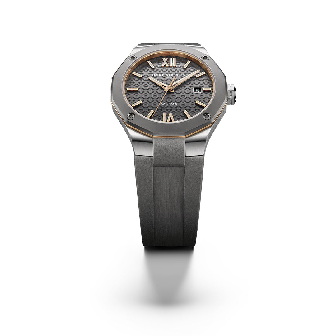 Baume & Mercier Riviera watch with gold accents. Baume & Mercier stainless steel & copper 'Riviera' automatic strap watch.