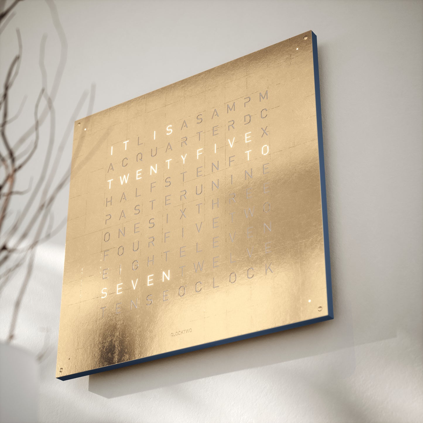 Qlocktwo Gold 45 Earth mounted on wall. Henry D Johnstone Jewellers. Alderley Edge, Poynton, Cheshire.