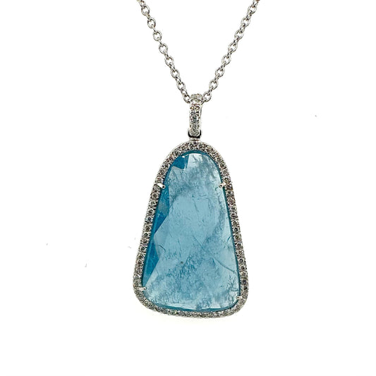 18ct White gold Aquamarine "Slice" pendant with diamond surround.
Henry D Johnstone Jewellers, Alderley Edge, Poynton, Cheshire.