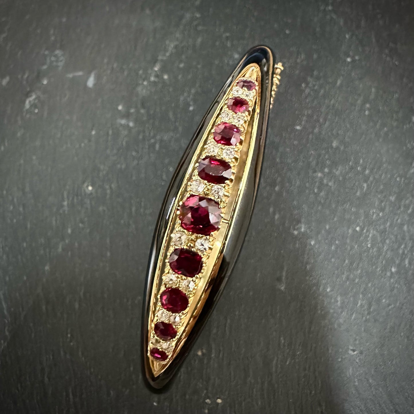 Pre owned ruby & diamond enamel oval hinged bangle - 0.40ct
