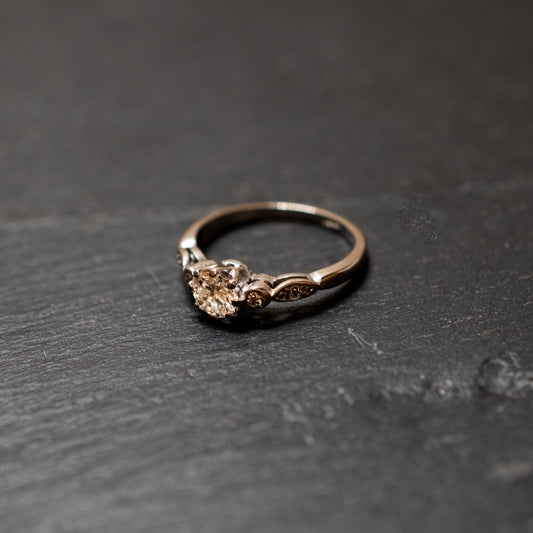 Pre-Owned: One precious white metal round brilliant cut diamond solitaire ring - 0.57ct.
