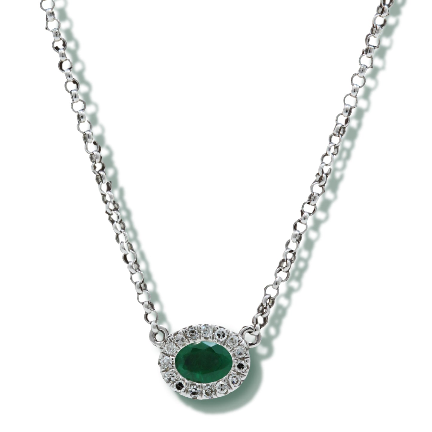 Exquisite jewellery: 9ct White Gold Necklace with Oval Emerald and Diamonds. Henry D Johnstone Jewellers, Alderley Edge, Poynton, Cheshire.