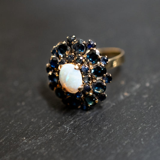 Precious Yellow Metal Oval Cabochon Opal and Sapphire Cluster Ring