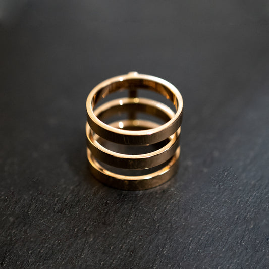 Pre-Owned: One 18ct rose gold triple row 'berbere' dress ring.