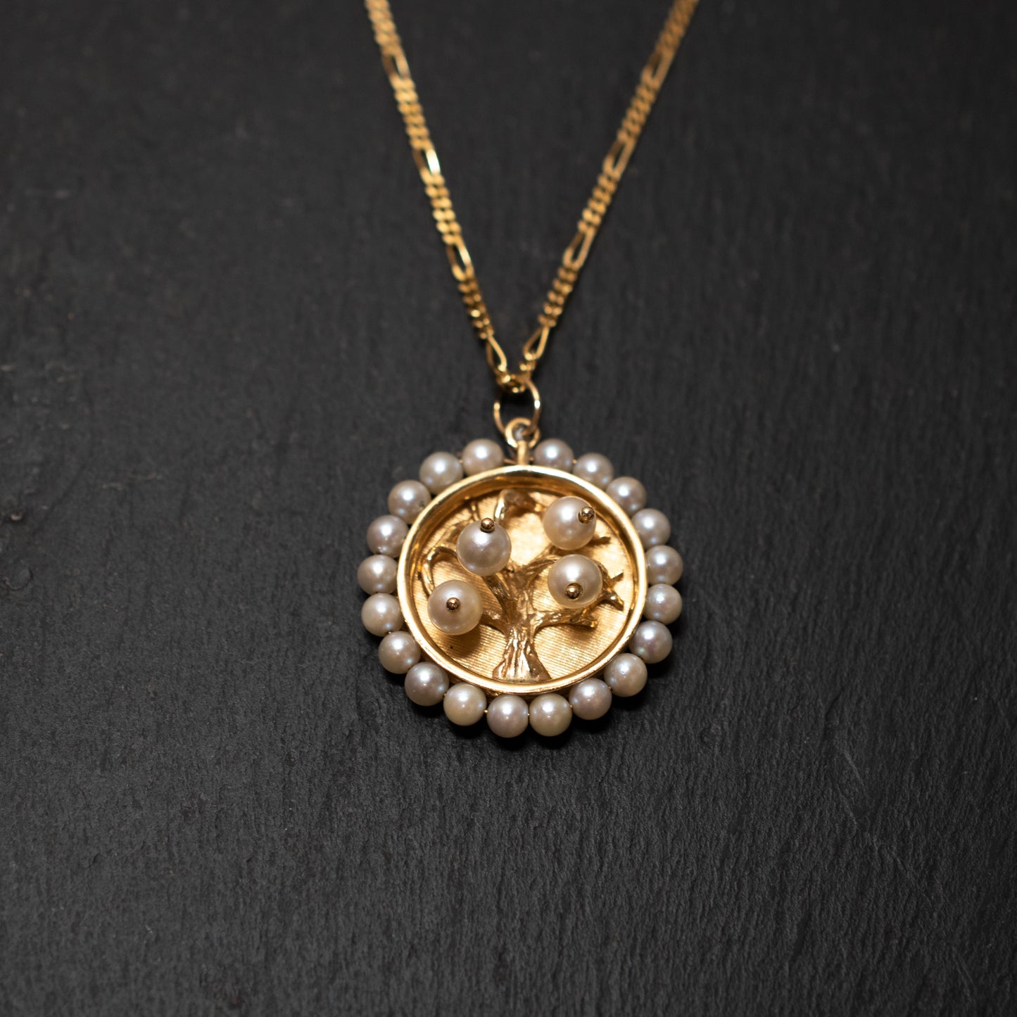 16633/16585 Pre-Owned 18ct Yellow Gold Polished Figaro Chain with a 14ct yellow gold 'Tree of Life' cultured pearl set pendant
