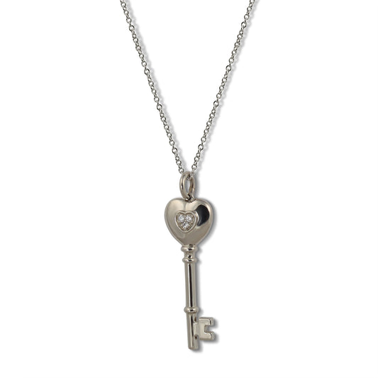 Palladium diamond set 'Heart Key' pendant. Henry D Johnstone Jewellers, Alderley Edge, Poynton, Cheshire.
