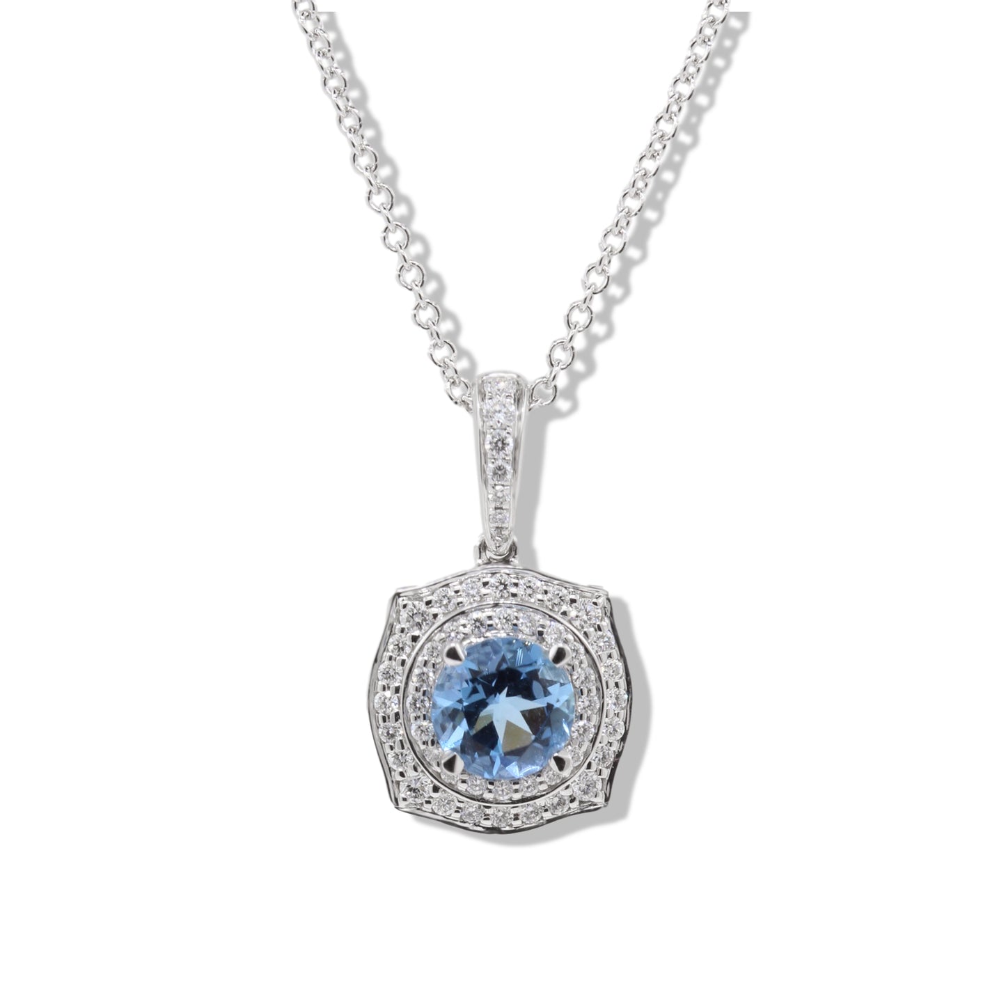 18ct white gold aquamarine & diamond cushion shaped pendant. Henry D Johnstone Jewellers, Alderley Edge, Poynton, Cheshire.