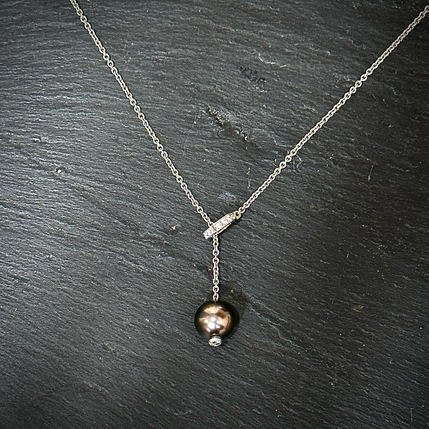 Pre-Owned: One 18ct white gold 'Mikimoto' Tahitian pearl diamond set shackle lariat necklace - 0.20ct.