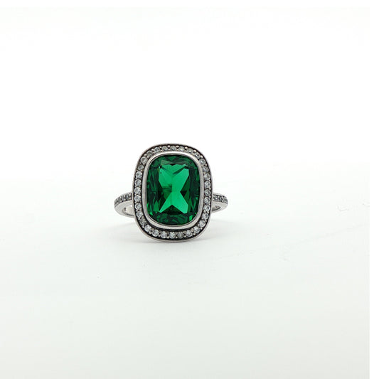 Carat Cushion cut & Emerald simulant ring with halo of white stones.