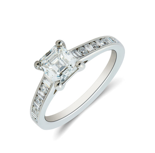 Platinum & Ascher cut diamond solitaire rind with inset round brilliant & baguette cut diamond shoulders - 1.48ct
