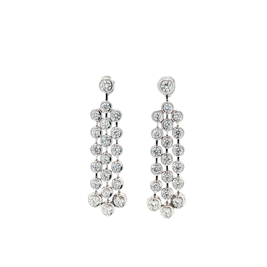 18ct white gold diamond set triple drop chandelier earrings.