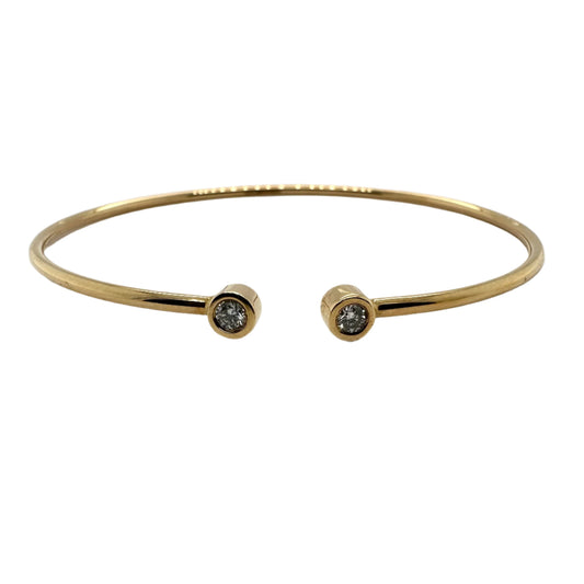 18ct yellow gold 'twist & torc' diamond set bangle - 0.10ct