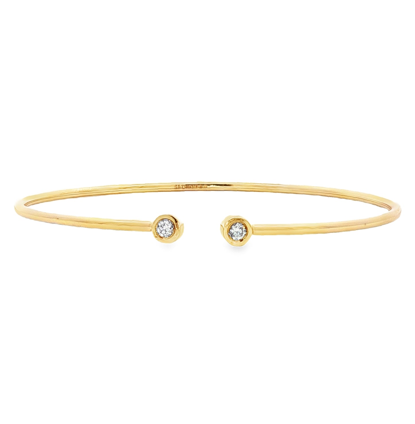 18ct yellow gold 'twist & torc' diamond set bangle - 0.10ct