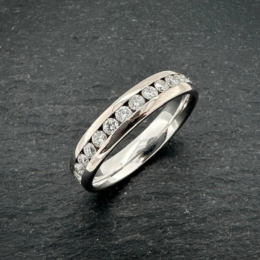 Pre-Owned: 18ct white gold & round brilliant cut diamond channel set eternity ring.