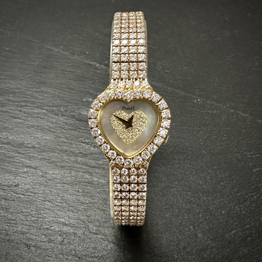 Pre-Owned: Piaget 18ct yellow gold heart shaped diamond set quartz ladies watch.