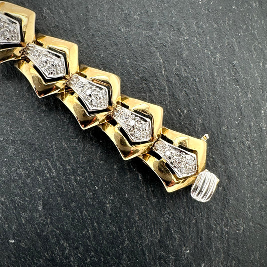 Pre-Owned: 18ct yellow & white gold diamond set fancy bracelet with box snap fastener and figure of eight clasp. 0.50ct