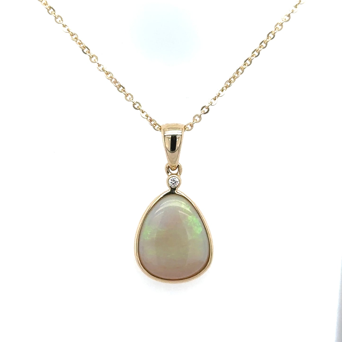 18771/18846 9ct yellow gold opal and diamond & rub-over pendant.